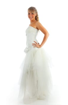 Young blonde woman posing in the bride dress