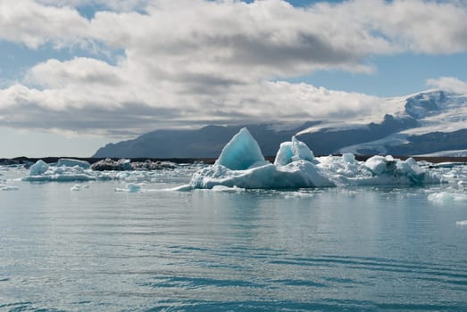 reflected on the glacier lake in Iceland Jokulsarlon