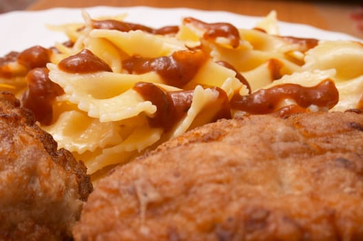 Bow pasta and rissoles