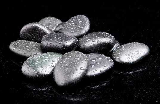Spa Stones. shiny zen stones with water drops