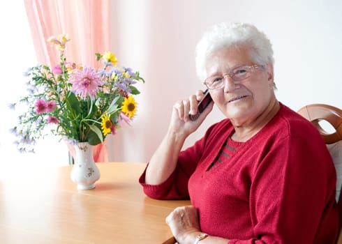Senior woman using mobile phone