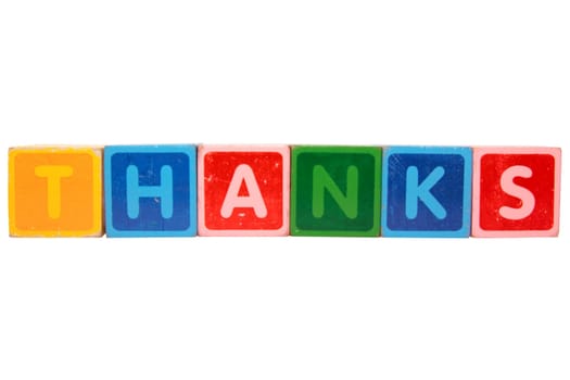 toy letters that spell thanks against a white background with clipping path
