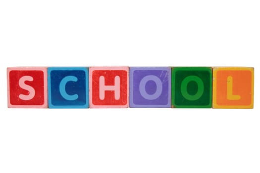 toy letters that spell school against a white background with clipping path