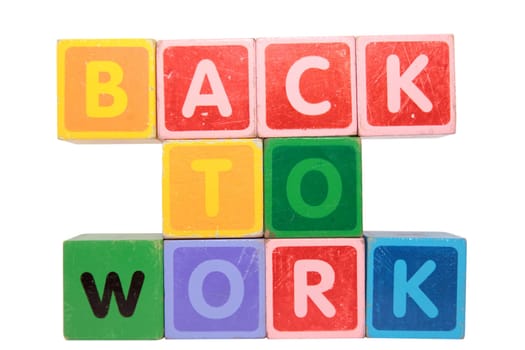 toy letters that spell back to work against a white background with clipping path