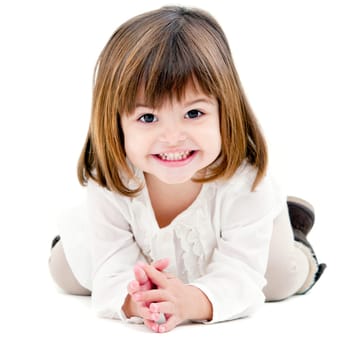 Portrait of cute little girl with toothy smile. Isolated on white background.