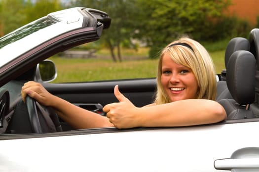 Young woman with convertible