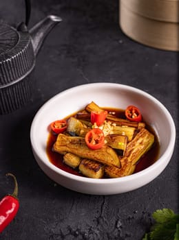 fried eggplant in soy sauce with garlic