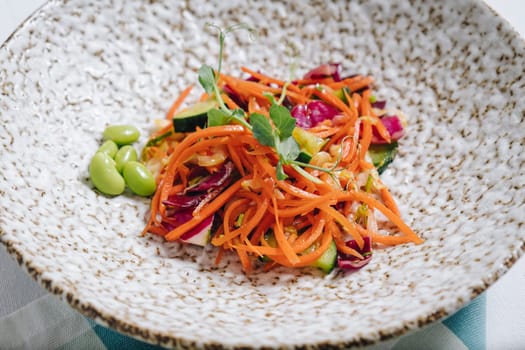 carrot salad with cucumbers, beans and herbs