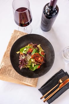 Vegetarian salad with avocado, basil, lettuce and cherry tomatoes. High quality photo