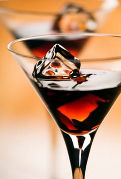 beautiful liqueur in martini glass close up shoot