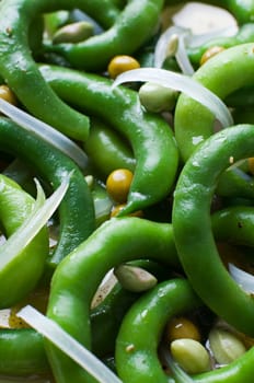 Fresh green bean salad with onion and vinegar close up