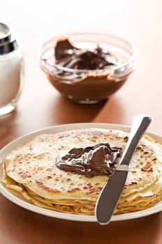 Fresh pancakes with chocolate close up shoot
