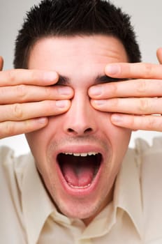 young business man shouting close up shoot