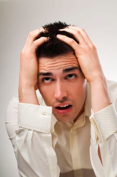 Young business man in stress close up shoot