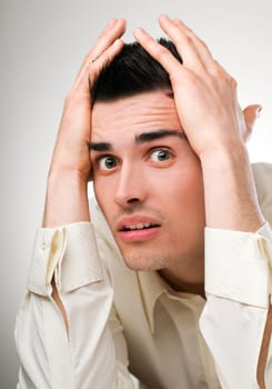Young business man in stress close up shoot