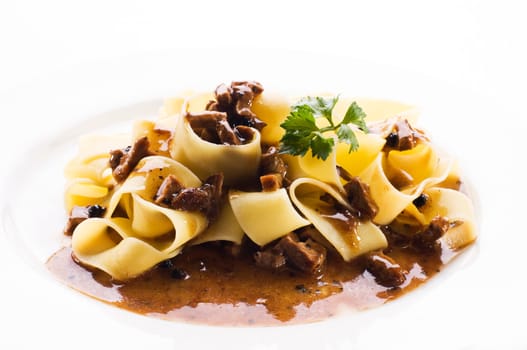 Fresh pasta with beef sauce close up