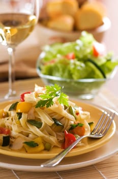 Fresh pasta salad with roasted vegetables close up