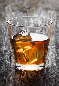 glass of whiskey with ice close up shoot