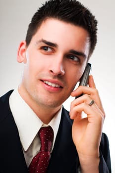 young business man talking on mobile phone