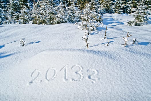Year 2013 written in snow with question mark