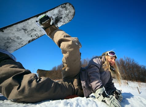 Girl  snowborder, Belokurikha, winter resort.