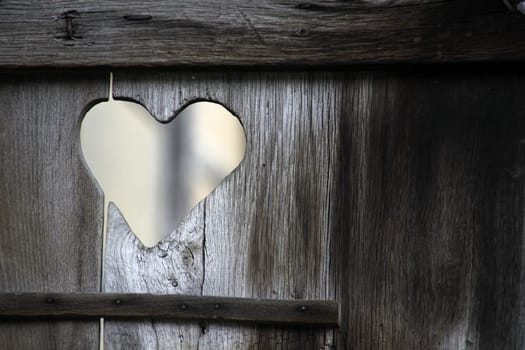 Heart in an old toilet door