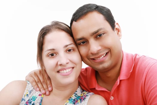 Young happy couple love smiling, looking at camera, isolated over white background