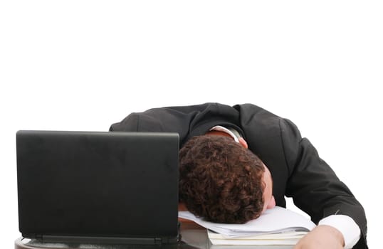 young business man sleeping on the laptop