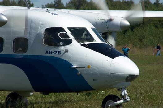 Skydiver&#039 s plane in airshow. Mochishe airport, Novosibirsk, august 2006