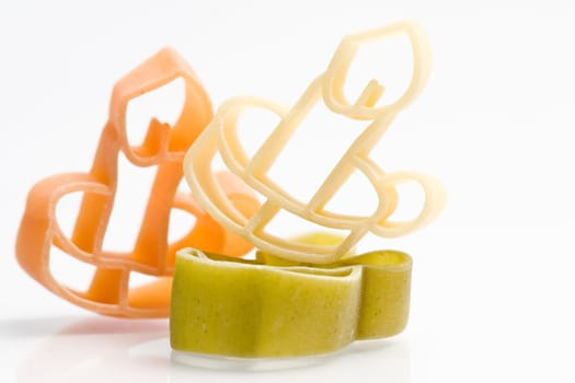 Christmas noodles on white background in different shapes