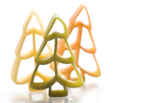 Christmas noodles on white background in different shapes