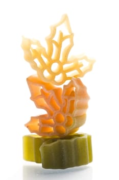 Christmas noodles on white background in different shapes