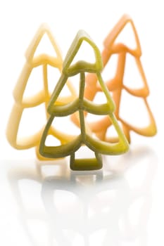 Christmas noodles on white background in different shapes