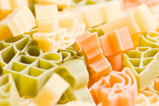 Lots of Christmas noodles in different shapes in a pile