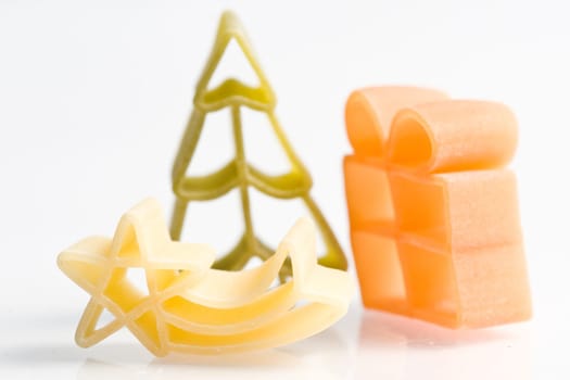 Christmas noodles on white background in different shapes