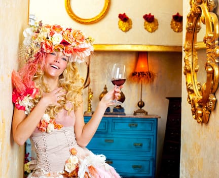fashion baroque blond womand drinking red wine in grunge house