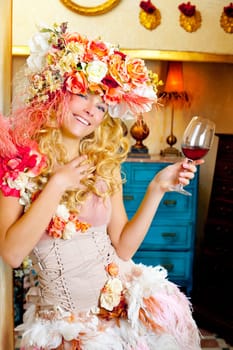 fashion baroque blond woman drinking red wine in grunge house
