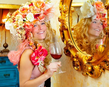 fashion baroque blond womand drinking red wine in grunge house