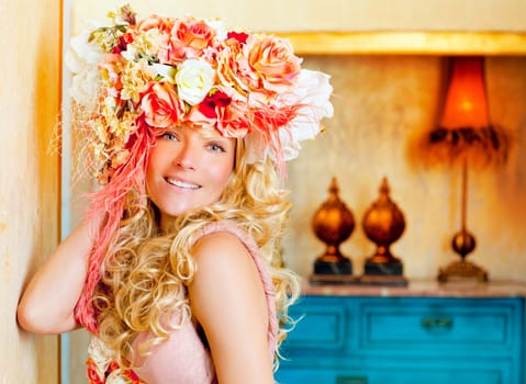 baroque fashion blonde woman in grunge interior with spring flowers hat