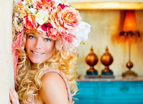 baroque fashion blonde woman in grunge interior with spring flowers hat