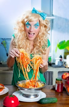 Blonde funny on kitchen with pasta and fashion blue makeup