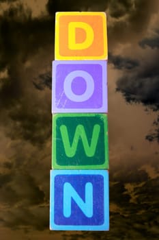 toy letters that spell down against a white background with clipping path