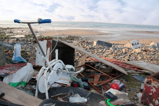 waste dumped on a scenic beach
