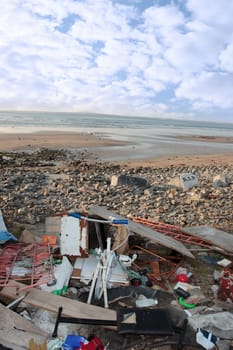 waste dumped on a scenic beach