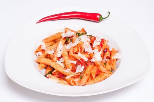 Pasta penne all'arrabboata with chilli,basil,tomato and pecorino cheese