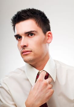 young serious business man portrait close up