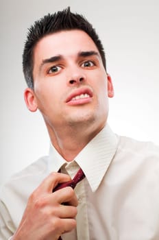 young unhappy business man close up portrait