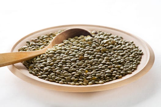 Green lentils on a plate close up shoot