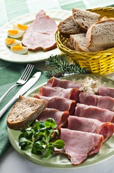 Fresh easter ham with eggs close up shoot