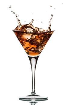 ice cube droping in to cocktail glass close up on white